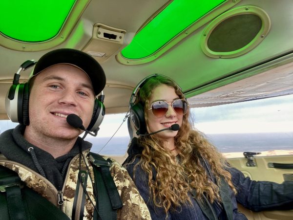 Instructor Josh Williams and Reporter Sarah Estes flying a Cessna-150