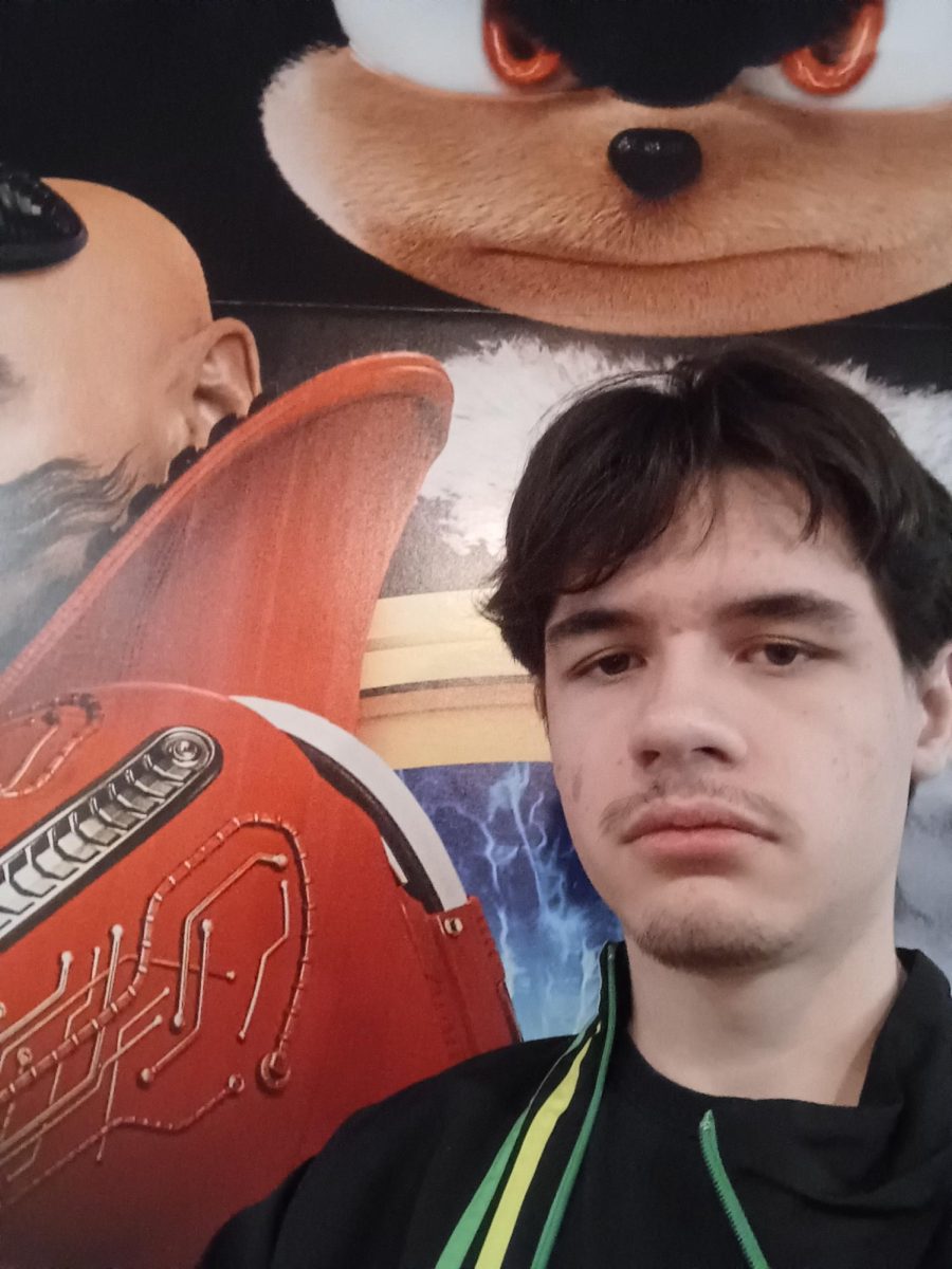 Picture taken by Phillip Lara, a selfie with a Sonic 3 poster at a movie theater